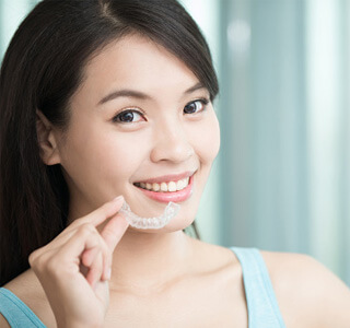 Female with Invisalign